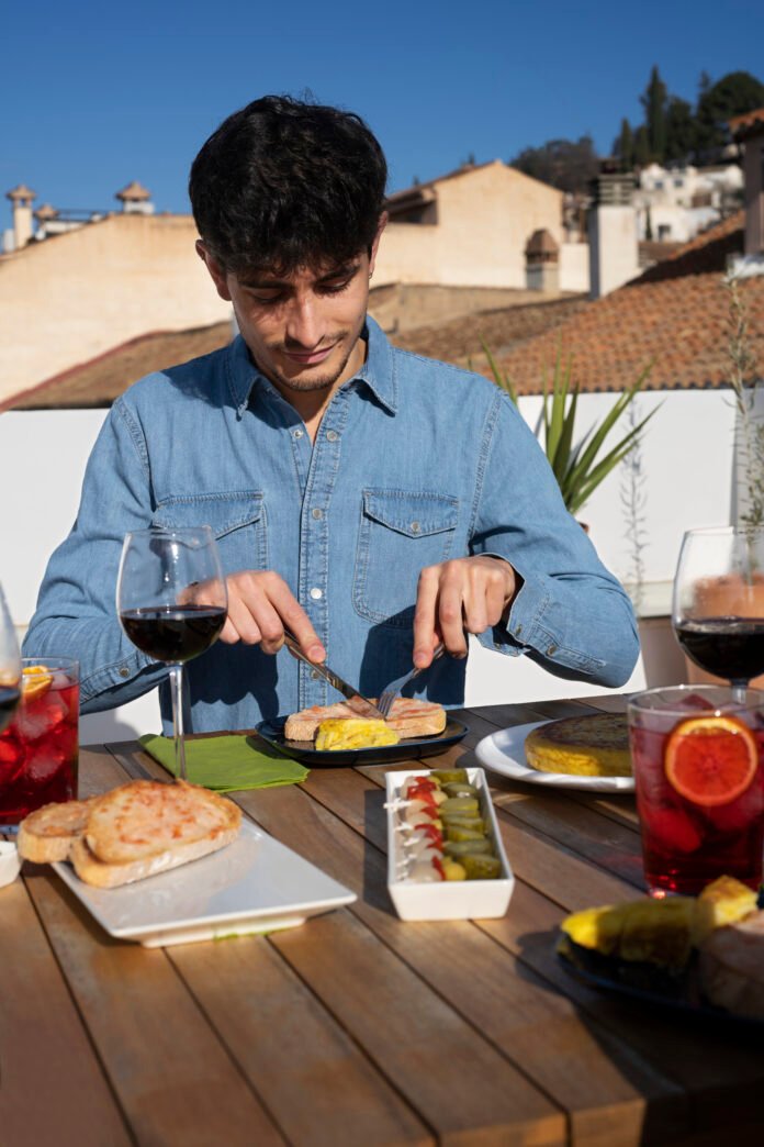 front-view-man-cutting-food